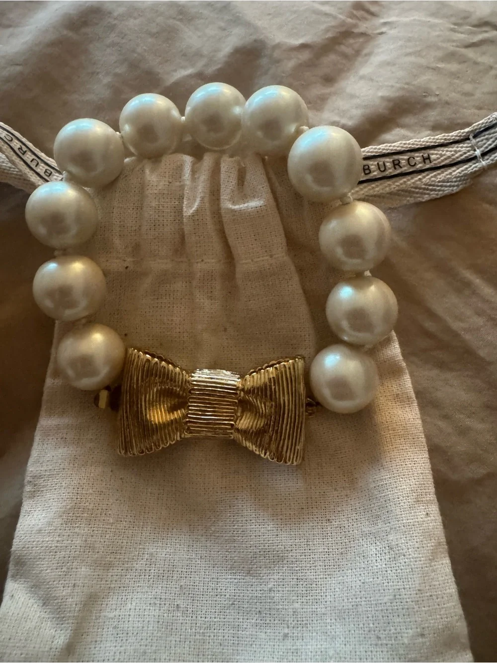 kate spade White Pearl Bracelet with Gold Bow Clasp
